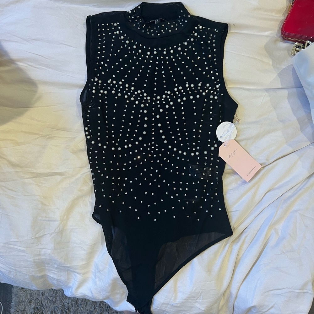 Sequin and pearl black bodysuit. Festival outfit